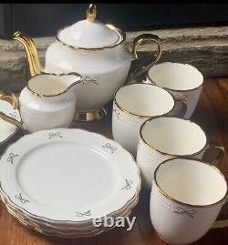 Viral coquette white with gold bows Tea Pot, Creamer. 4 Salad Plates, 4 Coffee Cup