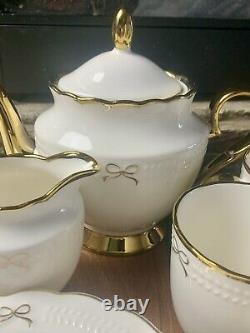 Viral coquette white with gold bows Tea Pot, Creamer. 4 Salad Plates, 4 Coffee Cup
