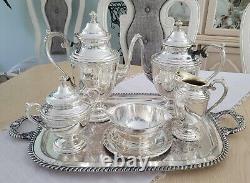 WM Rogers $ Son, Spring Flower Silver-plated Coffee/Teapot set Beautiful