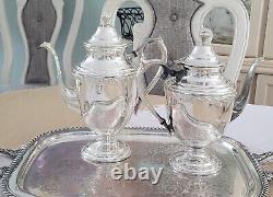 WM Rogers $ Son, Spring Flower Silver-plated Coffee/Teapot set Beautiful