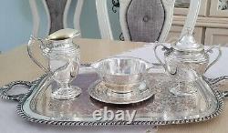 WM Rogers $ Son, Spring Flower Silver-plated Coffee/Teapot set Beautiful