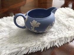 Wedge wood blue jasperware teapot, sugar bowl with cover, and creamer